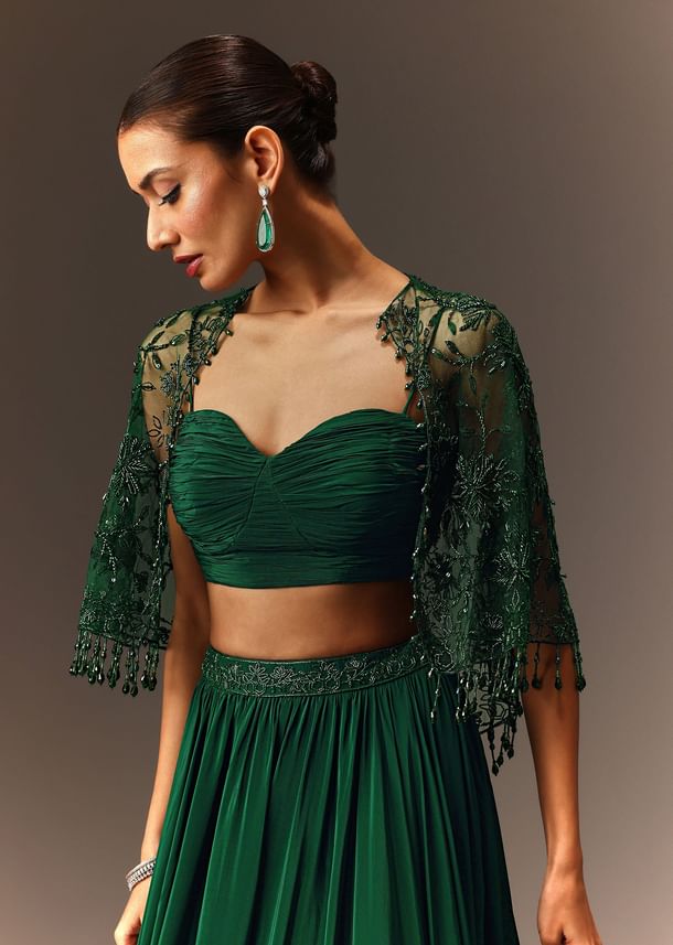 Bottle Green Tiered Lehenga With Net Cape