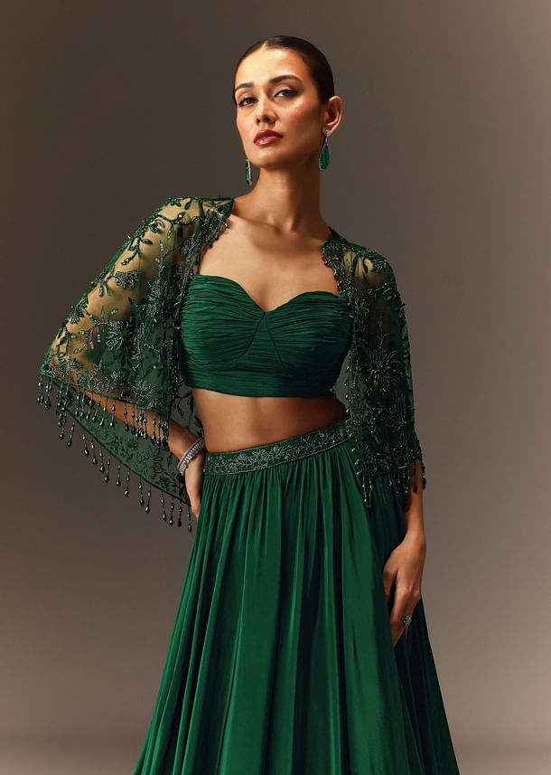 Bottle Green Tiered Lehenga With Net Cape