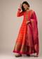 Coral Anarkali Suit In Brocade Silk With Woven Buttis And Zardosi Embroidery