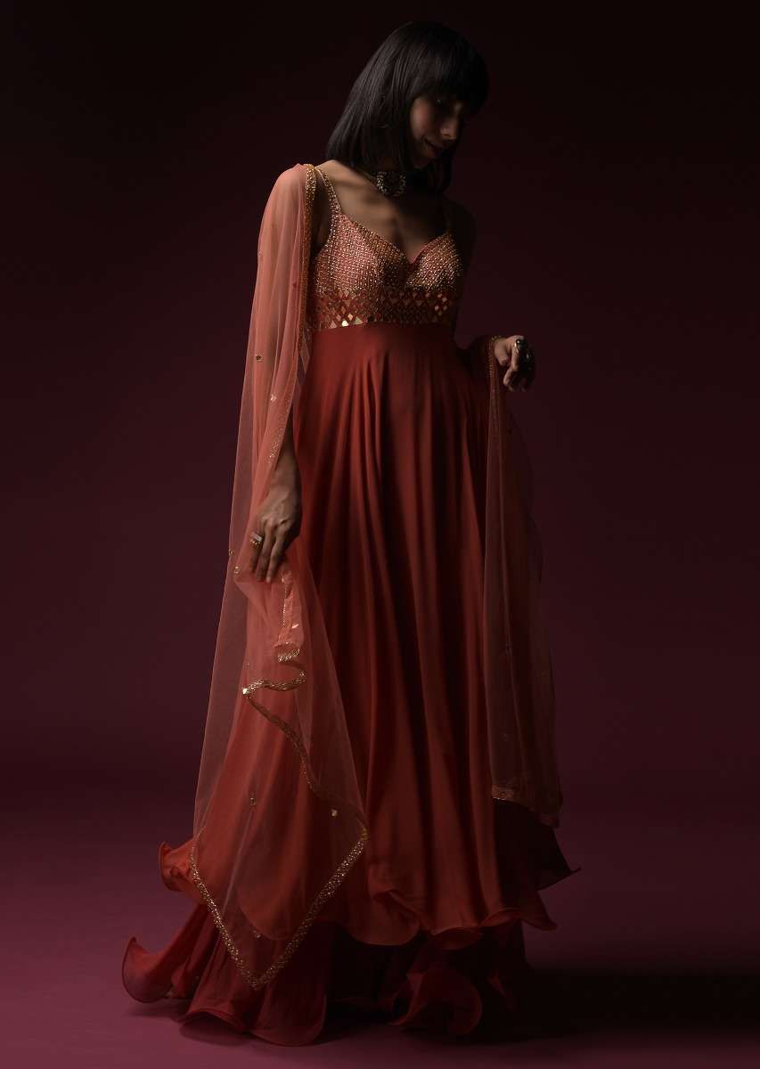 Coral Anarkali Suit With Geometric Shaped Mirror Accented Bodice And Fun Layered Hemline