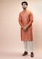 Coral Peach Nehru Jacket And Kurta Set With Resham And Mirror Embroidered Buttis And Stripe Design
