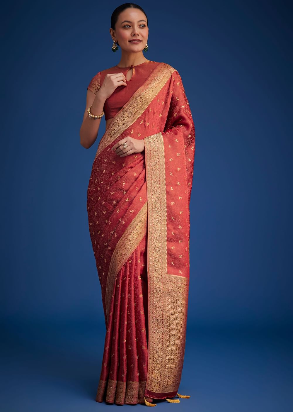 Dusky Orange Tissue Silk Saree With Zari Border And Butti Work