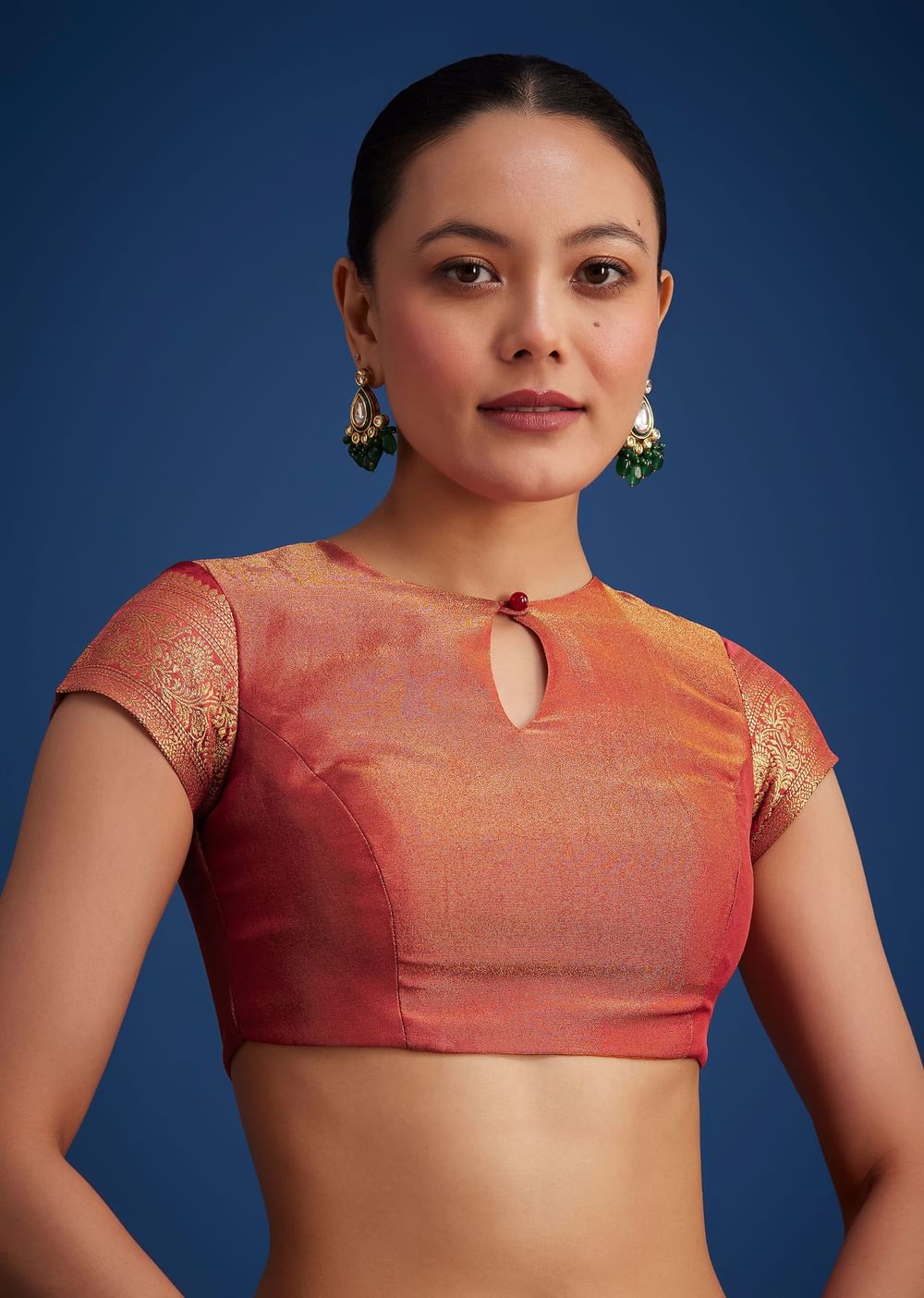 Dusky Orange Tissue Silk Saree With Zari Border And Butti Work