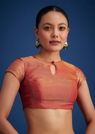 Dusky Orange Tissue Silk Saree With Zari Border And Butti Work