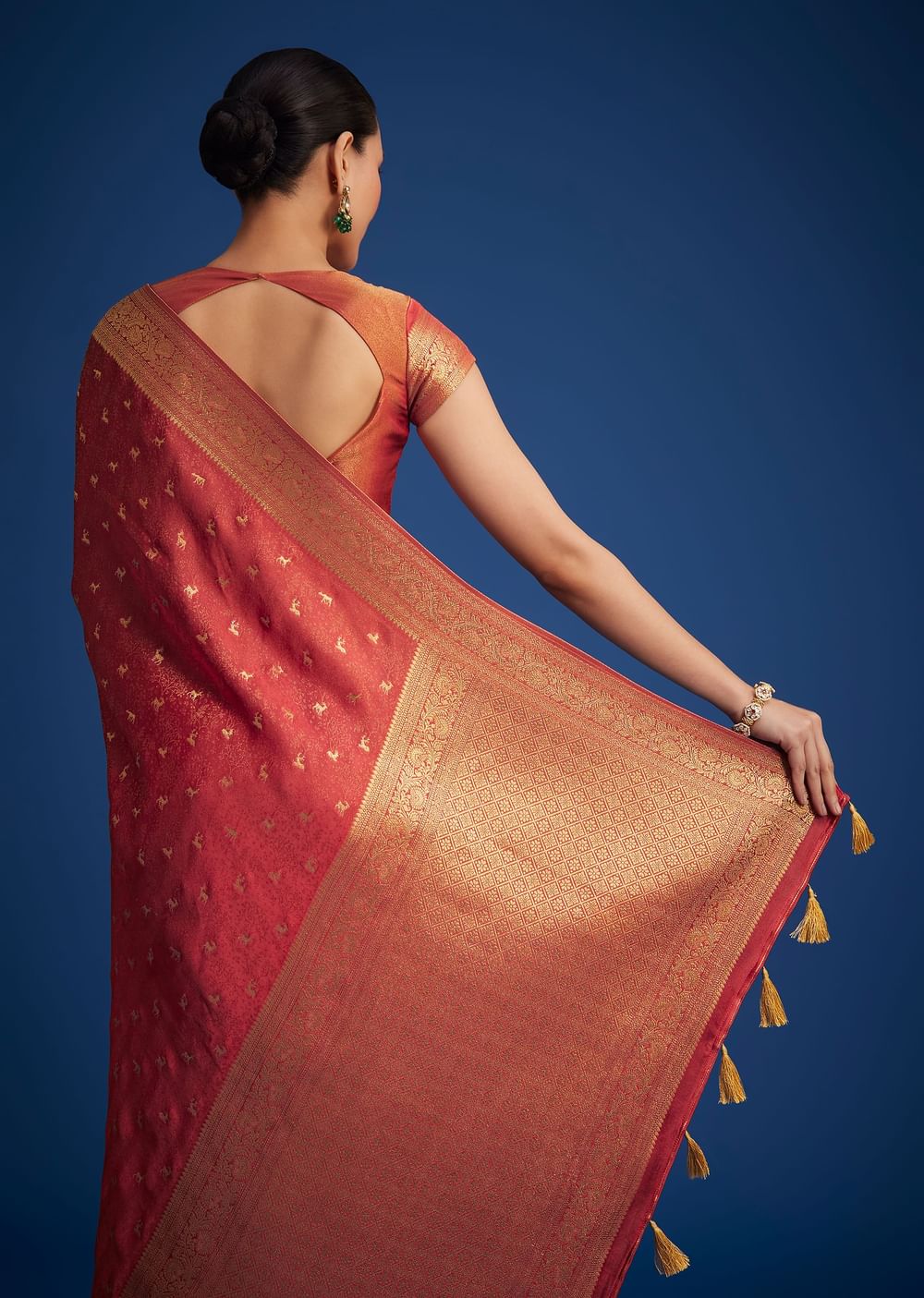 Dusky Orange Tissue Silk Saree With Zari Border And Butti Work
