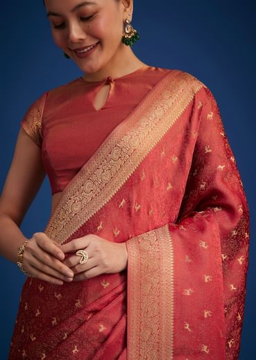Dusky Orange Tissue Silk Saree With Zari Border And Butti Work