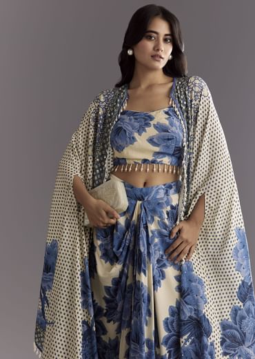 Cream Blue Floral Printed Croptop Skirt With Tassel Bordered Cape