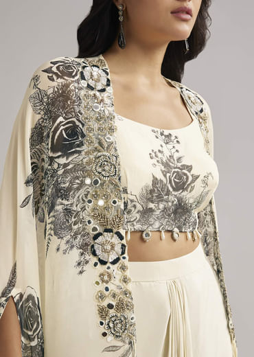 Cream Floral Cape Set With Crop Top And Skirt