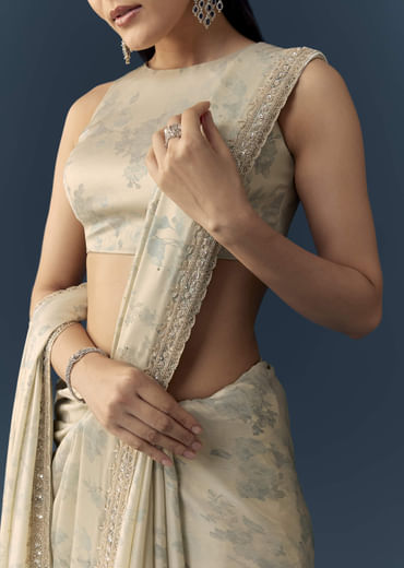 Cream Satin Saree with Floral Print and Unstitched Blouse