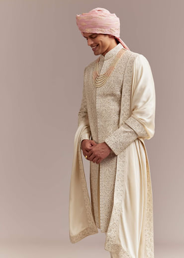 Cream Silk Sherwani For Groom With Floral And Geometric Embroidery