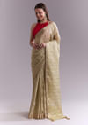 Cream Tissue Saree With Subtle Weave And Zari Border