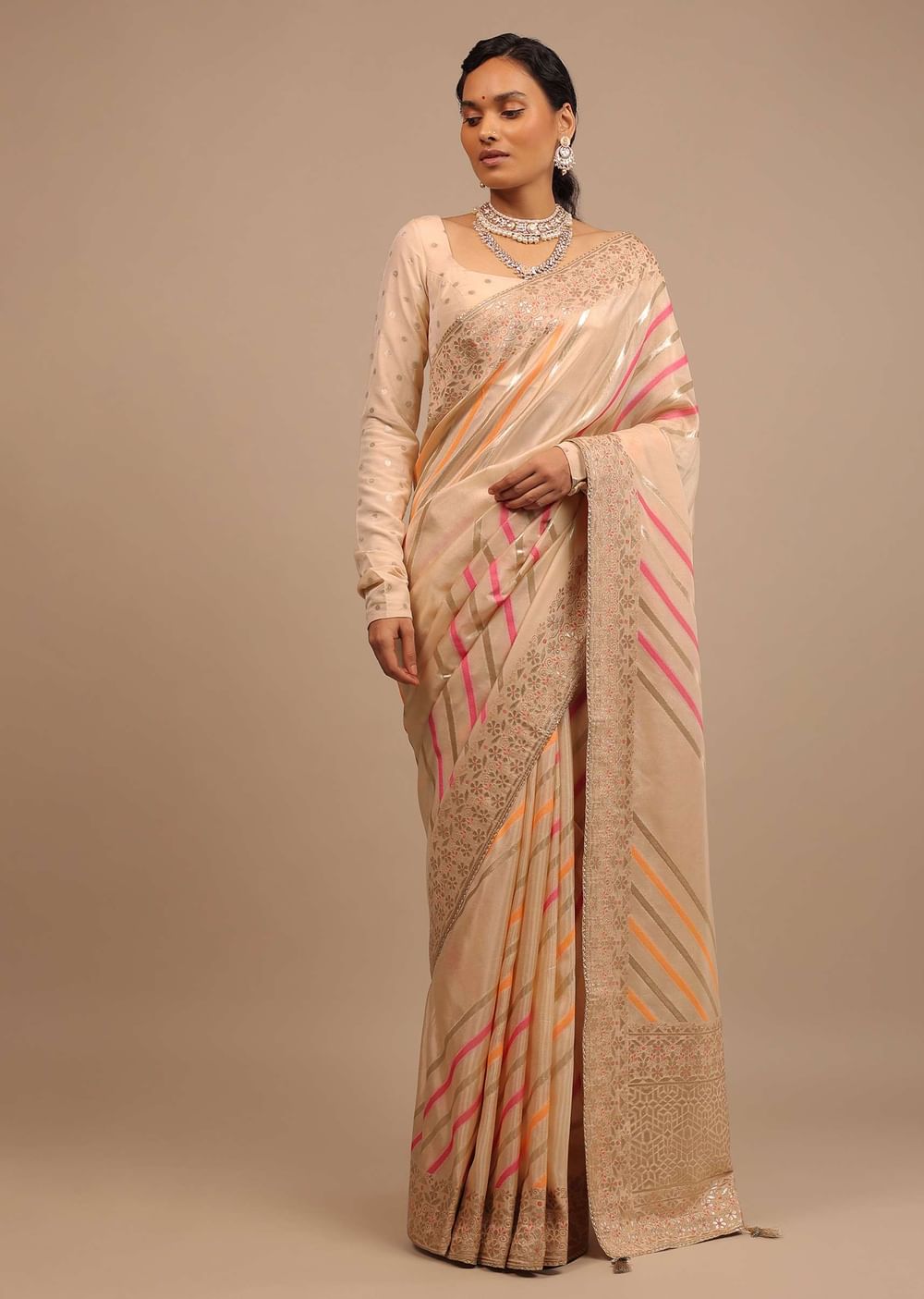 Cream Saree In Dola Silk With Multi Colored Woven Diagonal Stripes And Floral Border