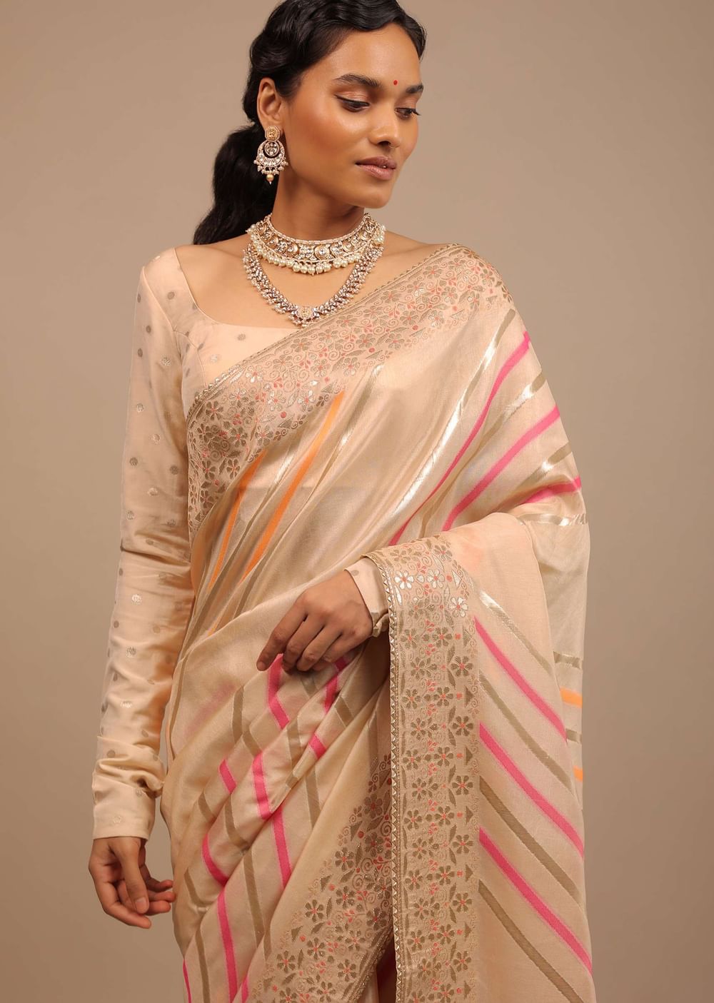 Cream Saree In Dola Silk With Multi Colored Woven Diagonal Stripes And Floral Border