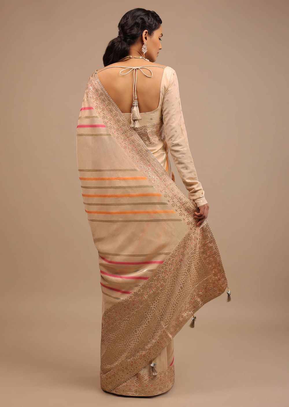 Cream Saree In Dola Silk With Multi Colored Woven Diagonal Stripes And Floral Border