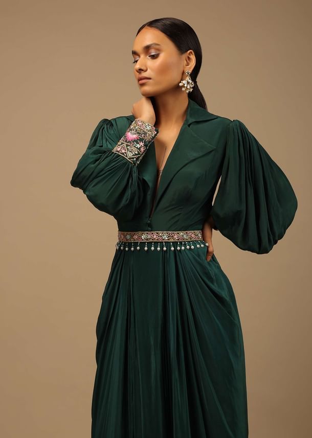 Dark Pine Green High Low Gown With Collar Neckline, Bishop Sleeves And Multicolor Handwork On The Cuffs Dark Pine Green High Low Gown With Collar Neckline, Bishop Sleeves And Multicolor Handwork On The Cuffs