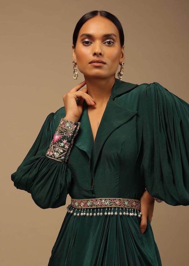Dark Pine Green High Low Gown With Collar Neckline, Bishop Sleeves And Multicolor Handwork On The Cuffs Dark Pine Green High Low Gown With Collar Neckline, Bishop Sleeves And Multicolor Handwork On The Cuffs