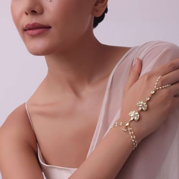 Delicate Gold Finish Hath Phool With Kundan Work
