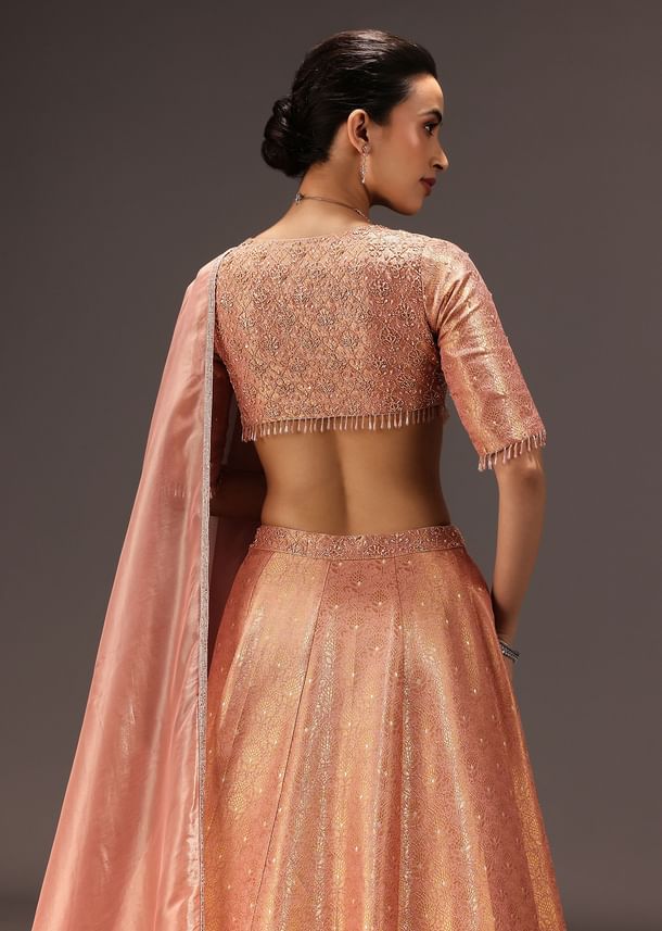 Dusty Peach Banarasi Silk Hand Work Lehenga Set Dusty Peach Banarasi Silk Hand Work Lehenga Set