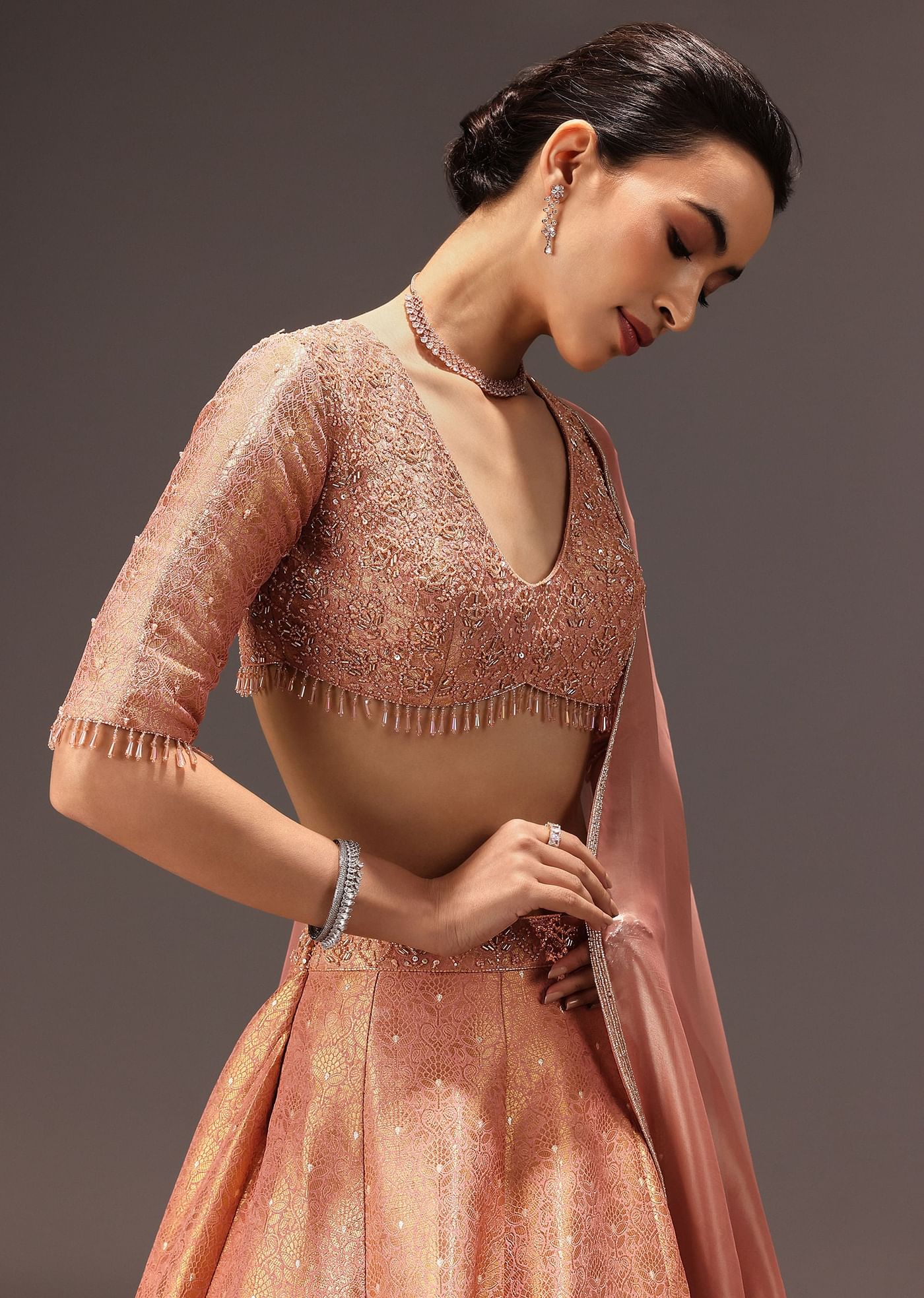 Dusty Peach Banarasi Silk Hand Work Lehenga Set