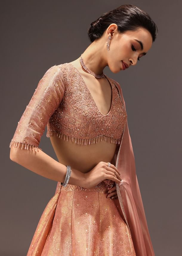 Dusty Peach Banarasi Silk Hand Work Lehenga Set Dusty Peach Banarasi Silk Hand Work Lehenga Set