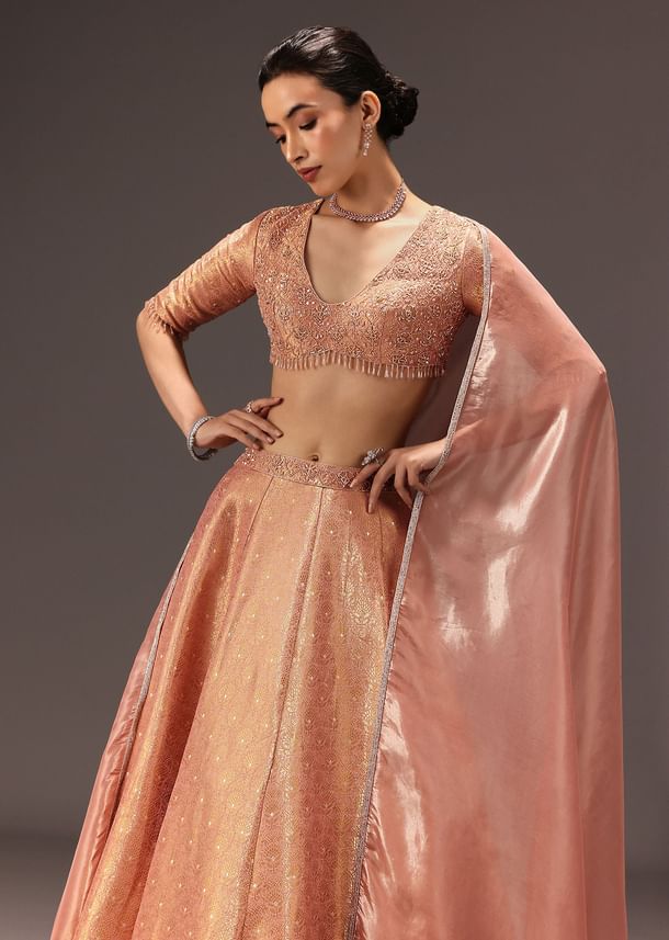 Dusty Peach Banarasi Silk Hand Work Lehenga Set Dusty Peach Banarasi Silk Hand Work Lehenga Set