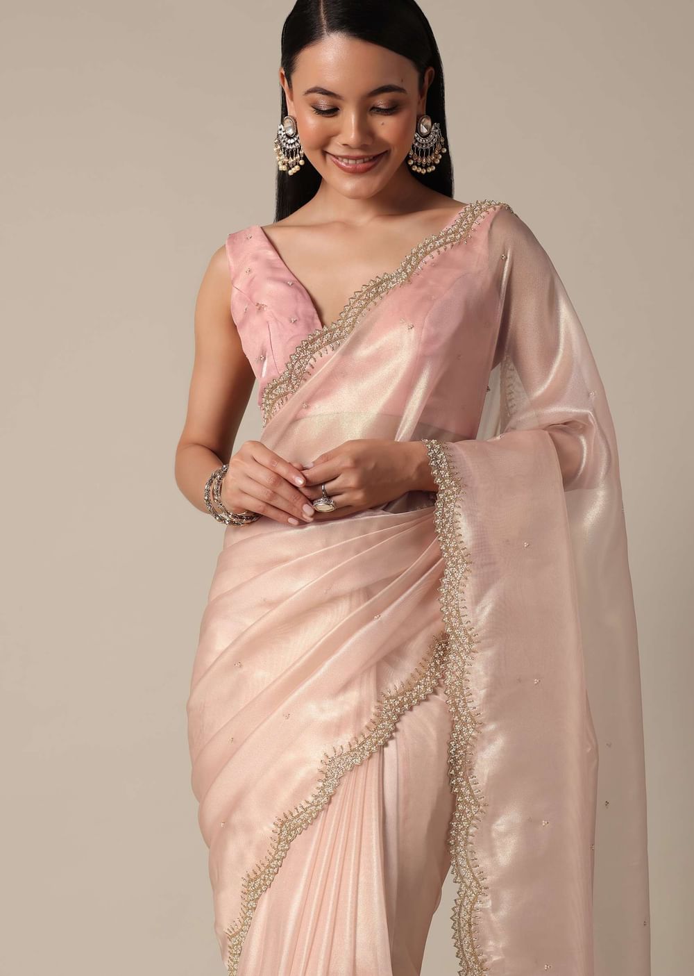Elegant Peach Saree With Scalloped Border