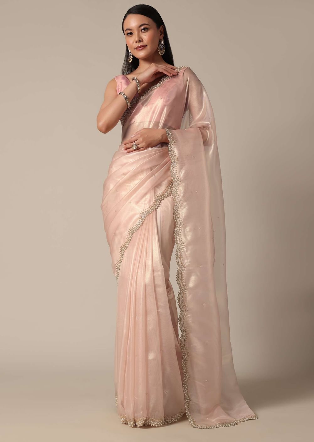 Elegant Peach Saree With Scalloped Border