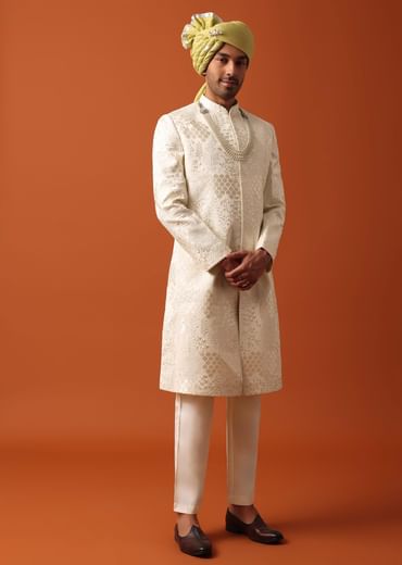 Elegant Pristine White Silk Sherwani Set With Intricate Embroidery Work