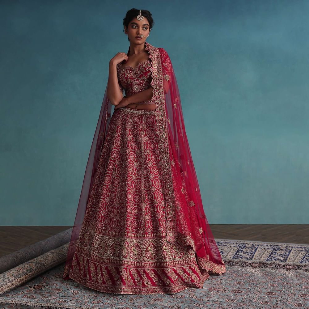 Fiery Red Embroidered Bridal Lehenga In Raw Silk With Hand Embroidery