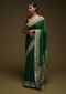 Forest Green Saree In Crepe Silk Blend With Gotta Patti Embroidered Buttis And Woven Border