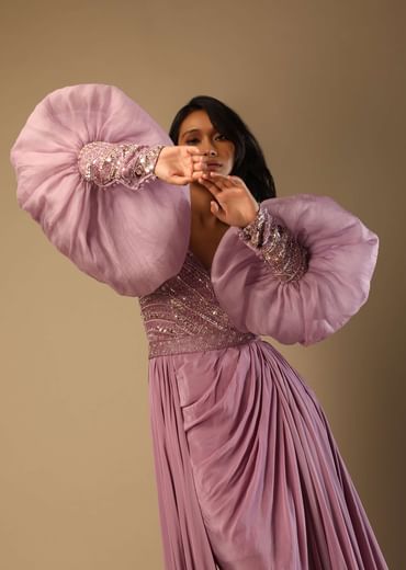 Frozen Mauve Gown With Hand Embroidered Bodice, Balloon Sleeves And A Long Trail