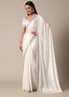 Glamorous White Chinnon Saree With Stone Embellishments