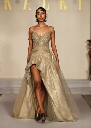 Gold Metallic Hand Embroidered Bridal Gown With Asymmetric Fall