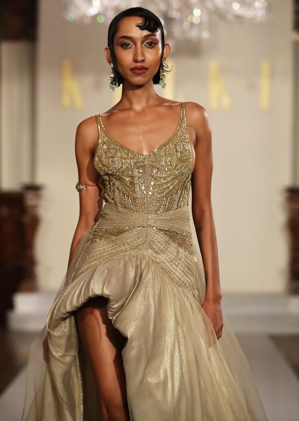 Gold Metallic Hand Embroidered Bridal Gown With Asymmetric Fall