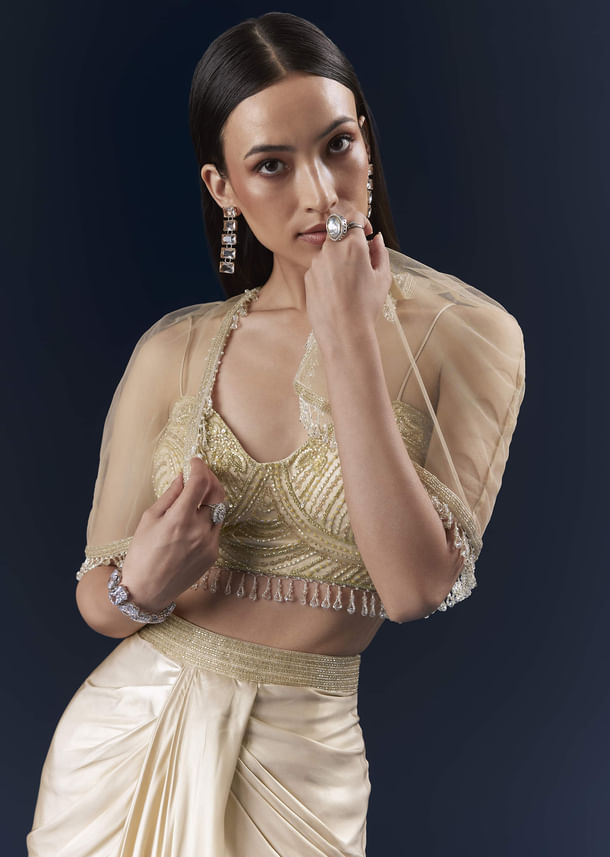 Gold Net Crop Top And Drape Skirt Set With Cutdana And Beads Work Gold Net Crop Top And Drape Skirt Set With Cutdana And Beads Work