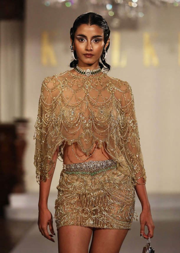 Gold Net Indo Western Jewelled Cape And Skirt Set With Tassels