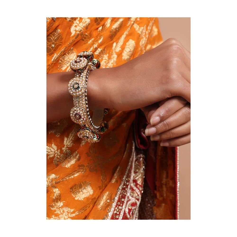 Gold Plated Kada With 3D Design Embedded With Pearls And Multi Color Minakari