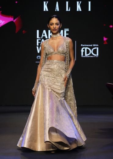 Gold Banarasi Embroidered Long Jacket With Sleeveless Blouse And Fishcut Lehenga
