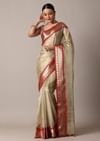 Gold Chanderi Kota Silk Woven Saree With Mirror Work And Unstitched Blouse Piece