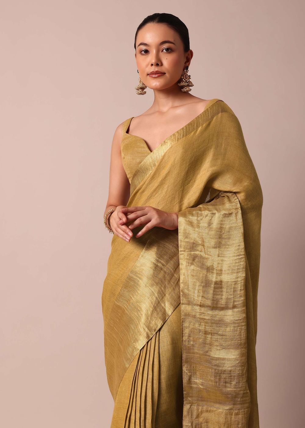 Gold Cotton Linen Saree With Zari Border And Unstitched Blouse Piece