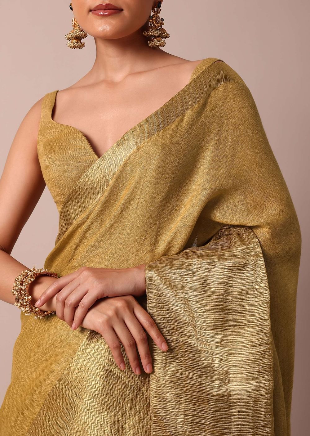 Gold Cotton Linen Saree With Zari Border And Unstitched Blouse Piece