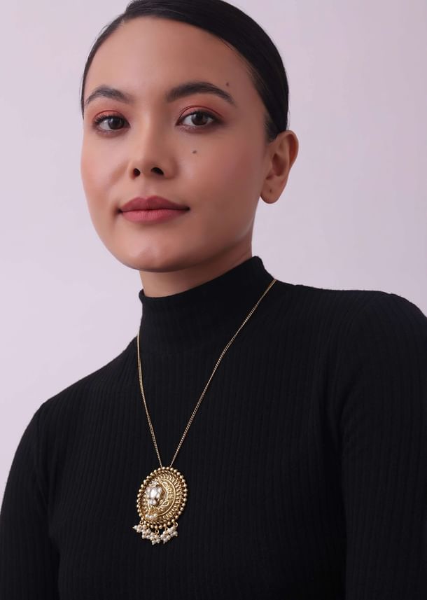 Gold Finish Long Necklace Embedded With A Small Motif Gold Finish Long Necklace Embedded With A Small Motif
