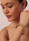 Gold Finish Temple Style Carved Bangle In Mix Metal