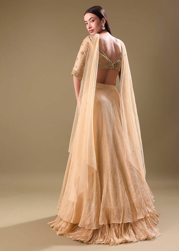 Gold Hand Embroidered Tissue Lehenga And Blouse With Dupatta