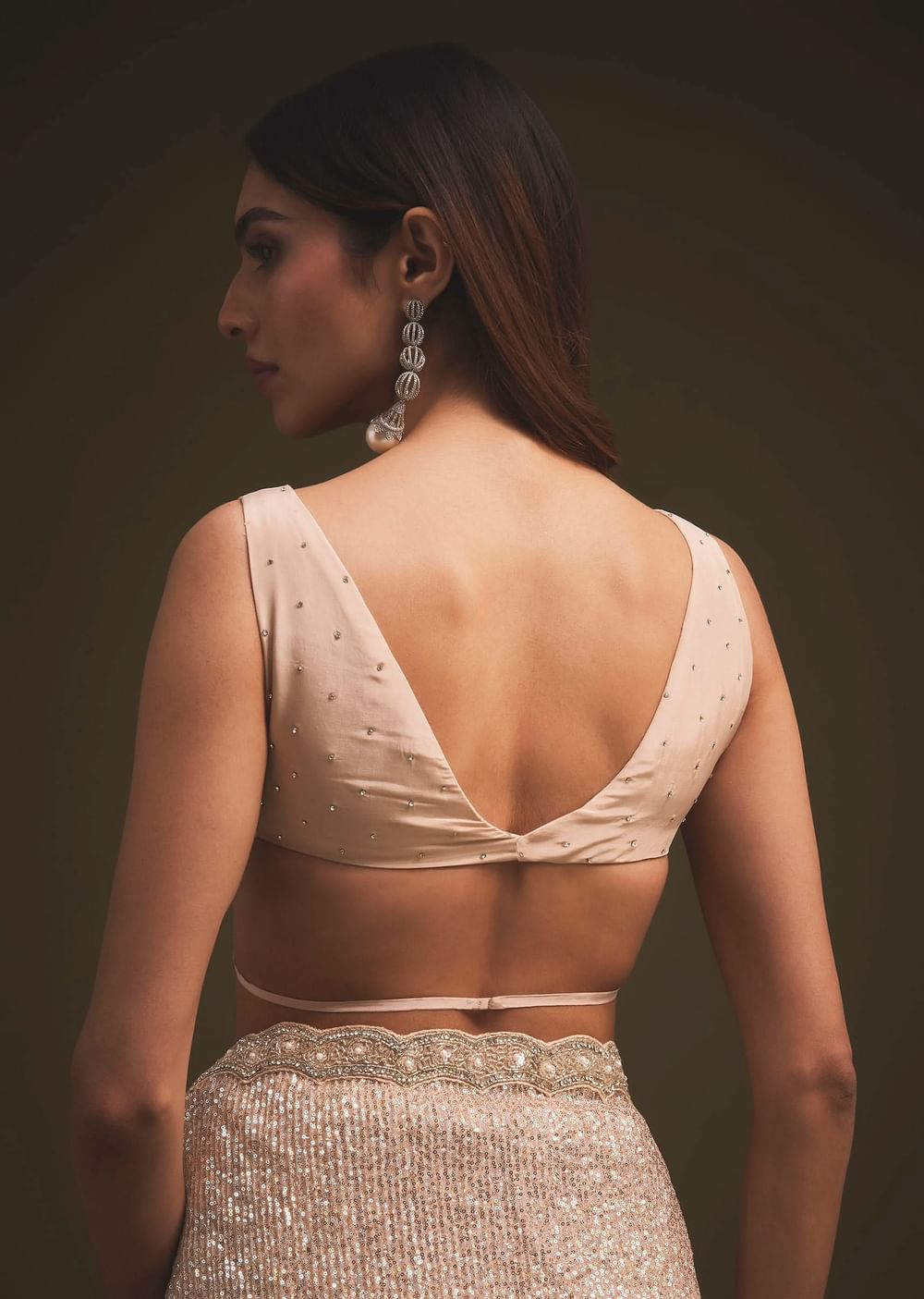 Gold Sequins Saree With An Embellished Border