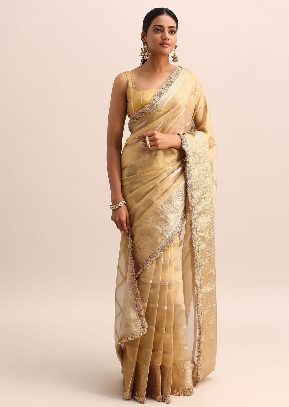 Gold Silk Saree With Zari Woven Border And Zari Frill With Unstitched Blouse