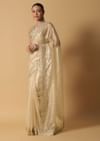 Gold Toned Foil Saree Fabricated In Tissue With Cut Dana Embellished Borders