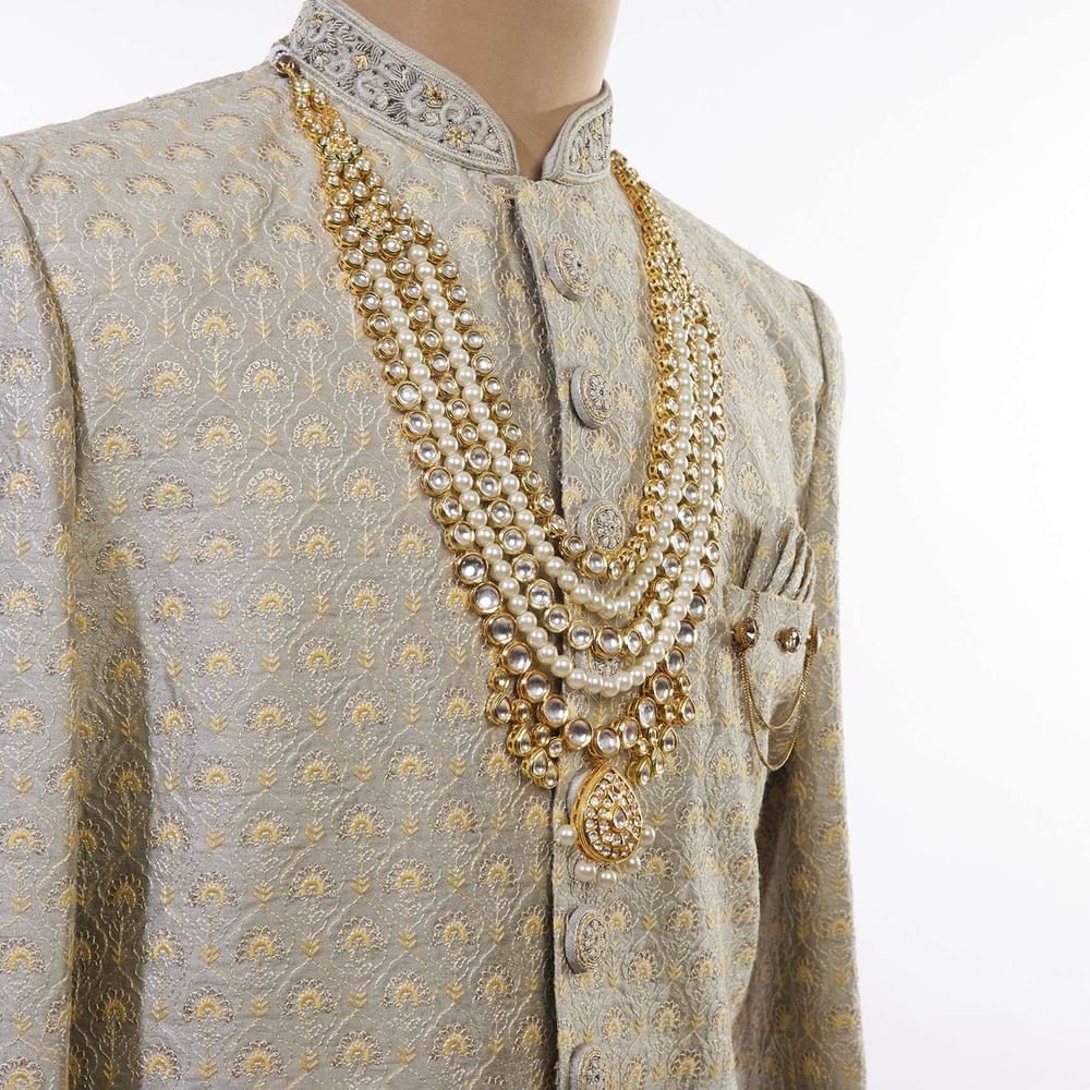 Gold Toned Multi Layered Pearl And Kundan Mala