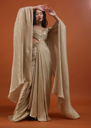 Mocha Brown Gown With A Pre-Pleated Dhoti Skirt And Royal Cape Sleeves - NOOR 2022
