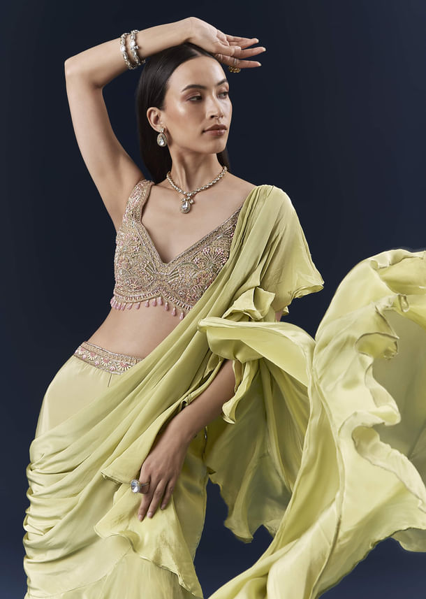 Green Crepe Ready Pleated Saree With Intricate Embroidery Green Crepe Ready Pleated Saree With Intricate Embroidery